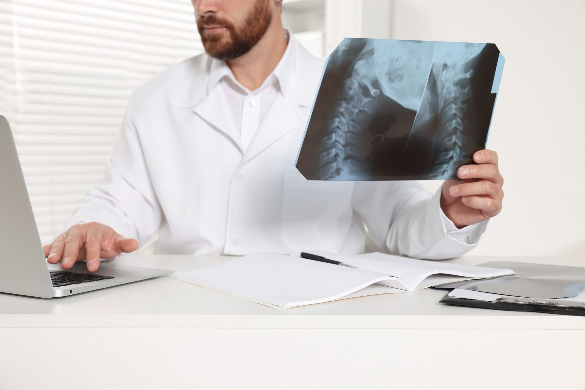 Young Man Wearing Neck Brace During Consult